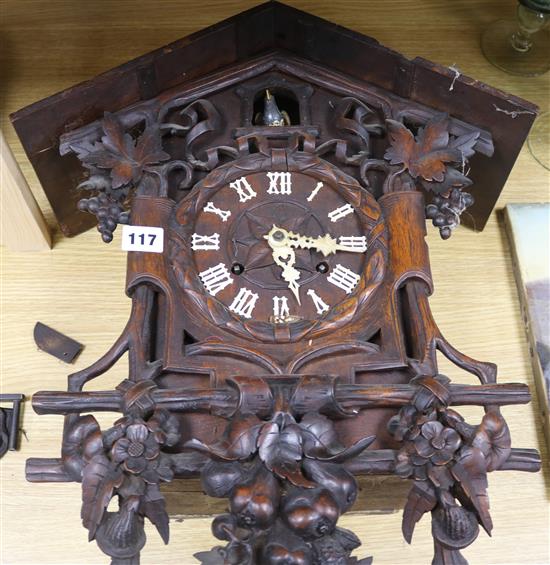 A Black Forest cuckoo clock H.53cm. W.43cm.